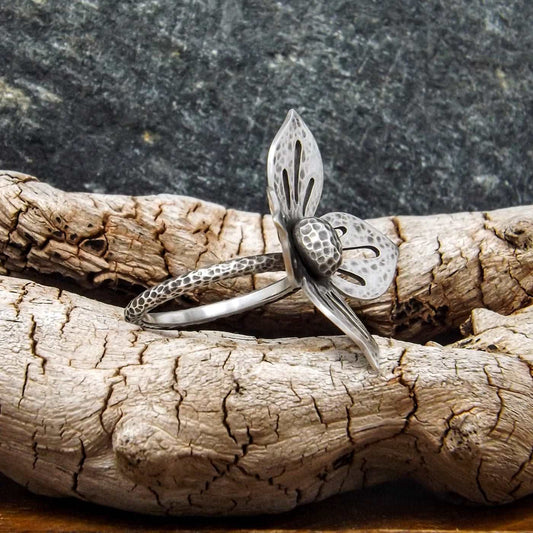Side view of a one-of-a-kind argentium and sterling silver flower ring.