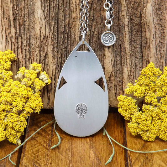 Back view of a sterling silver om necklace with a .925 makers mark.