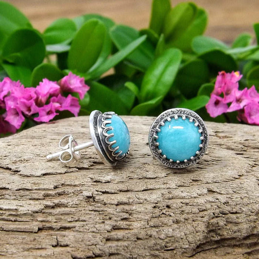 Side view of a pair of sterling silver amazonite stud earrings.