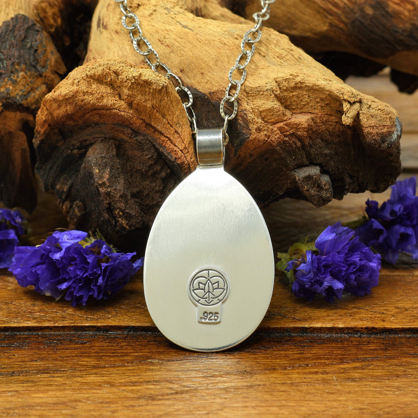 Back view of sterling silver cherry blossom and crescent moon necklace with  .925 makers mark.